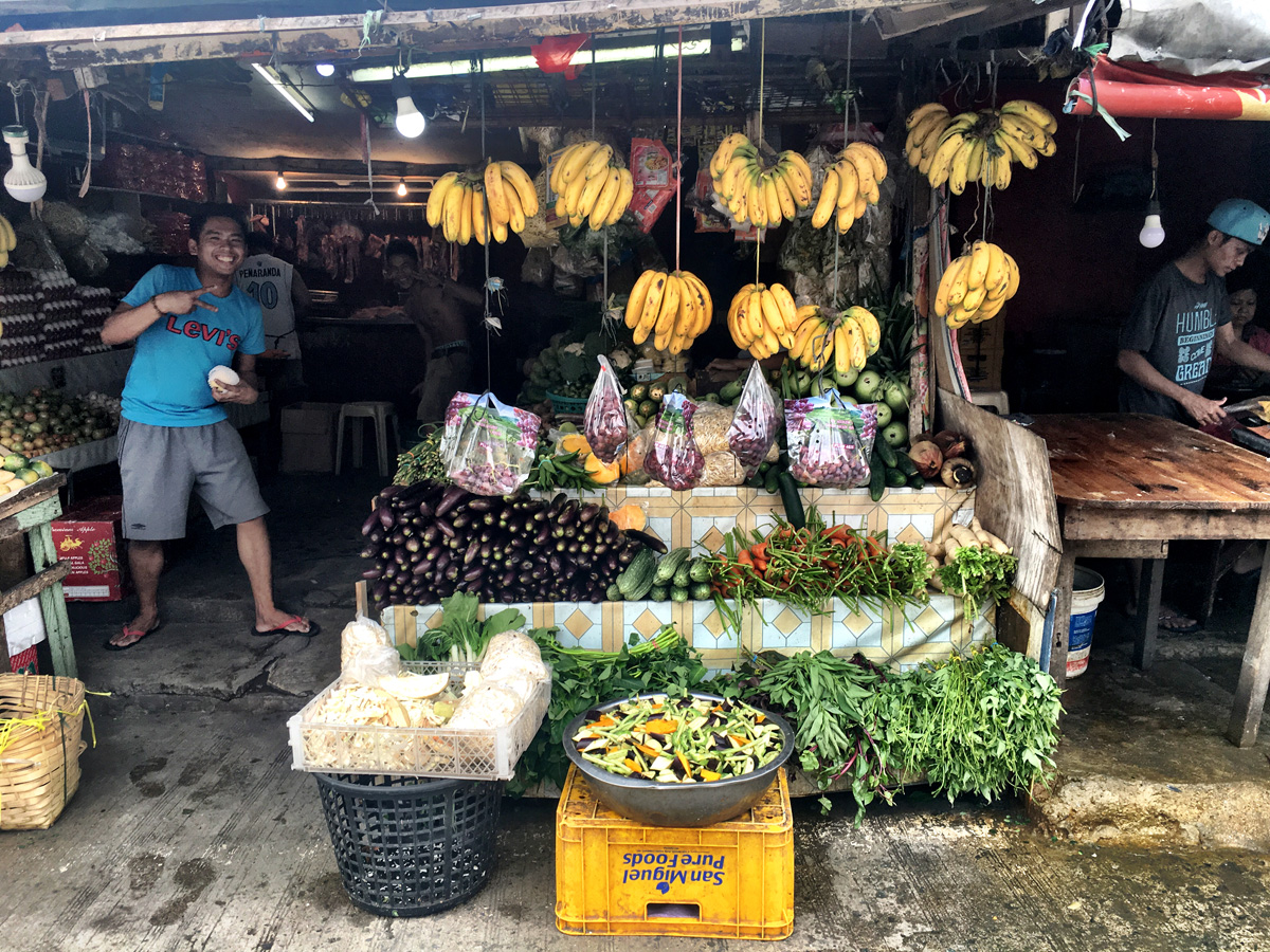 Street vendor selling fruits.